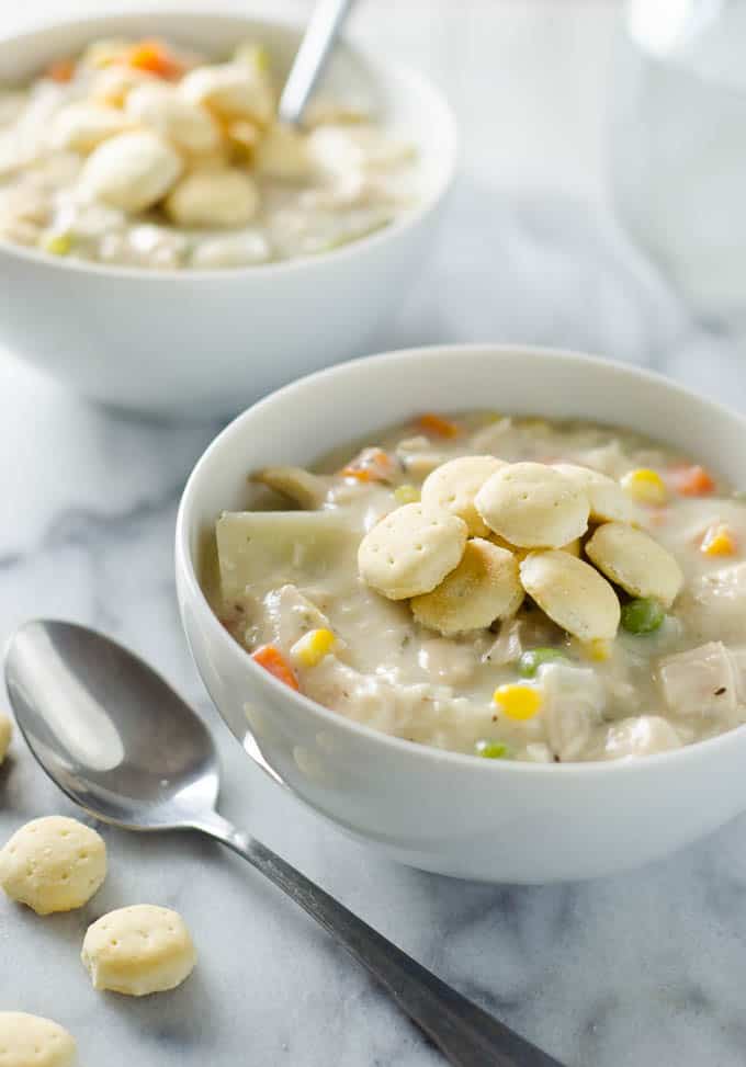 Chicken Pot Pie Soup -This delicious chicken pot pie soup is everything you love in the pie, served now in a creamy soup form. www.domesticdee.com