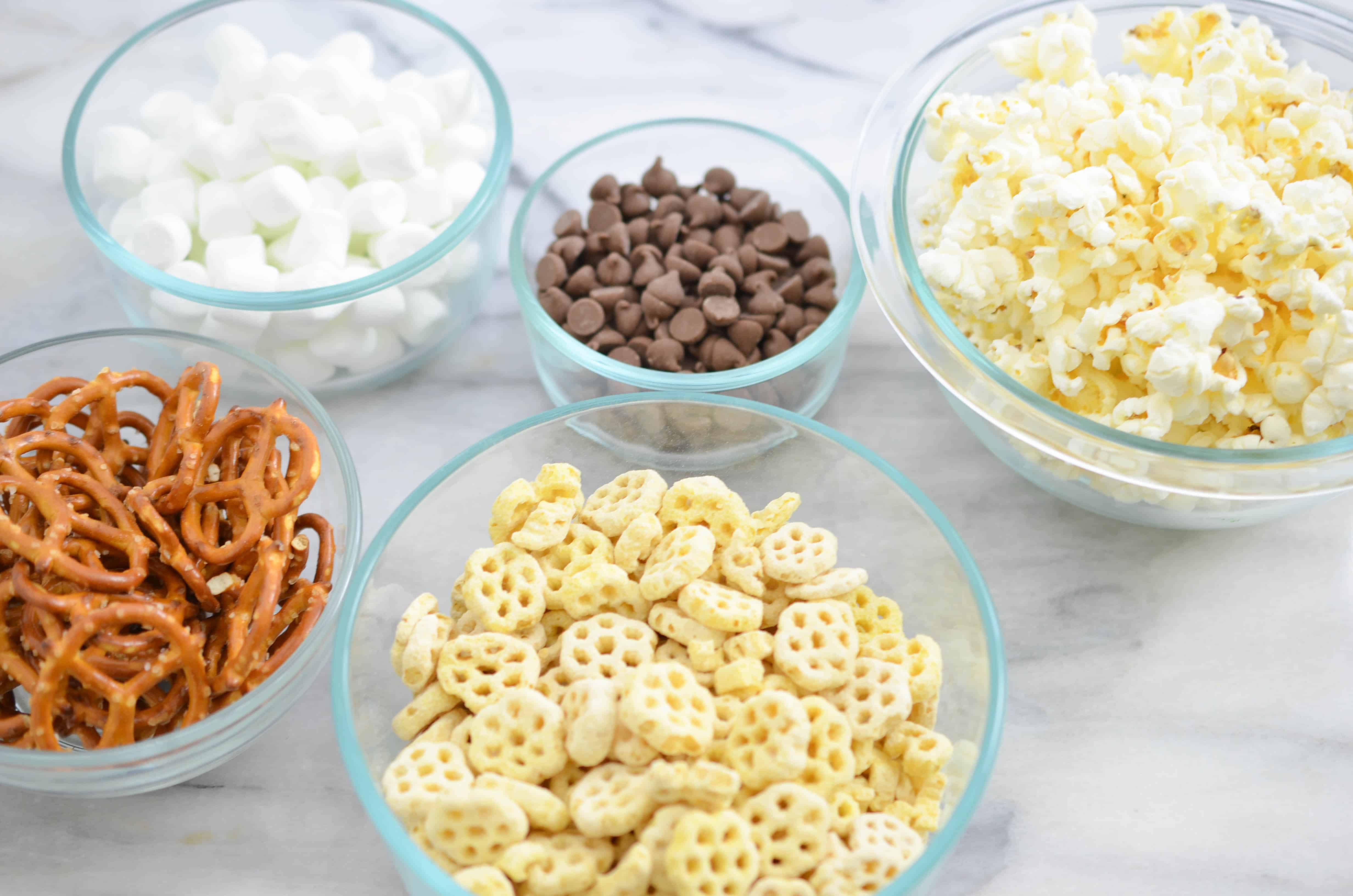 This snack mix recipe is made with a family favorite, Honeycomb cereal. This mix includes pretzels, popcorn, marshmallows, and is topped with a milk chocolate drizzle. A treat all kids will enjoy.