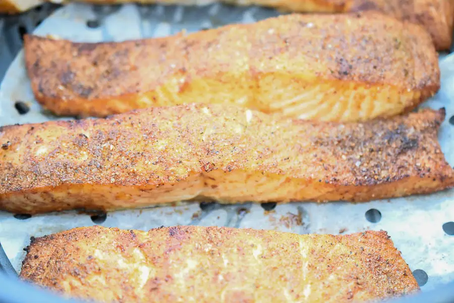Air fryer salmon is an easy main dish that is delicious and is ready within minutes! The air fryer makes the salmon tender, crispy and juicy in under 15 minutes! This is the perfect main dish to throw together on those busy weeknights.