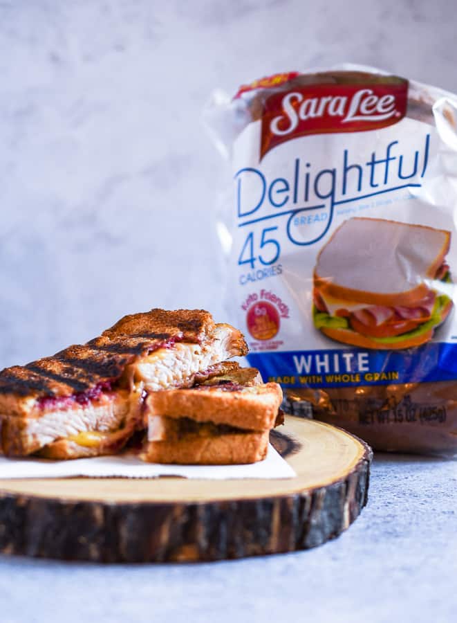 This Turkey Cranberry Panini Sandwich joins all your favorite Thanksgiving dishes into one delicious Panini Sandwich. Juicy, sliced turkey breast, cranberry sauce, and sliced gouda cheese combined into a panini.